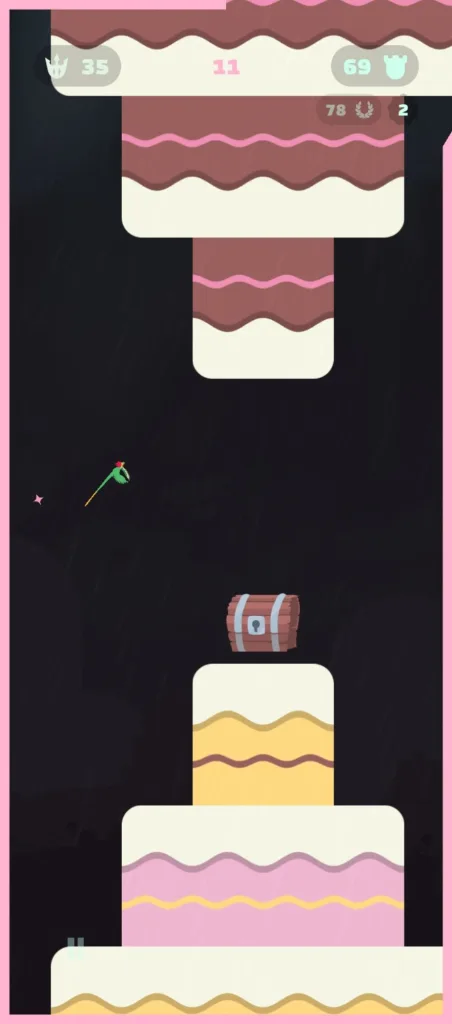 Pionowy zrzut ekranu z gry Flappy Dragon, gdzie zielony smok frunie między platformami w kształcie warstw tortu na ciemnym tle.