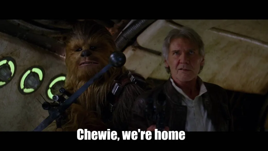 Chewbacca i Han Solo siedzą w kokpicie statku kosmicznego.