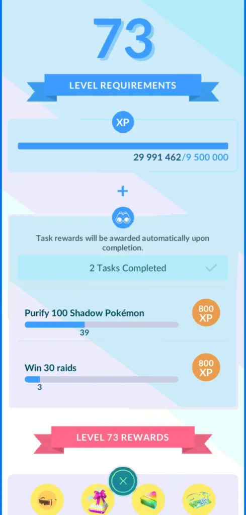 Ekran gry Pokemon GO pokazujący postęp w zdobywaniu poziomu 73, z listą zadań do wykonania i nagrodami.